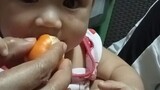 Rai baby first time to eat oranges
