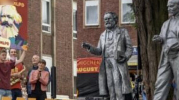 Although he said he didn't miss the past, the old professor from East Germany always sang revolution