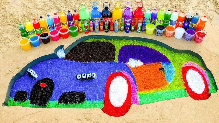 如何用 Orbeez、可口可乐、山露水、芬达和曼妥思制作彩虹布加迪汽车