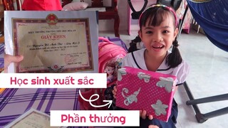 Giấy khen học sinh xuất sắc và phần thưởng lớp 1 của bé Anh Thơ