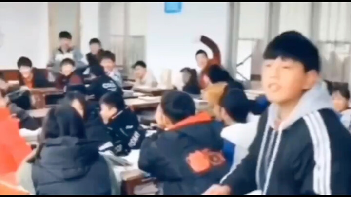 Whether the classroom is chaotic or not depends entirely on what the back row says.