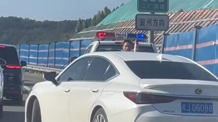 Traffic jam on the highway—police rush to handle the accident.