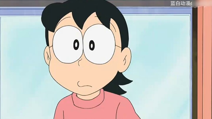 Doraemon: Nobita pulled out a lot of blue fat men from the photo, and they had a fight because of th