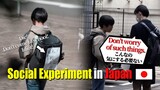 Boy with slanderous paper on back. | Social Experiment in Japan