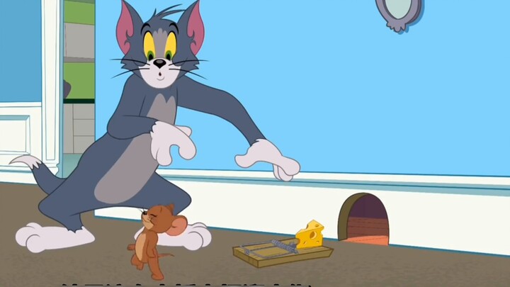 Jerry watches the video to gain new knowledge. The scary cucumber scares the cat.