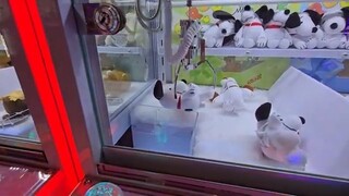 Surrounded by So MINI Claw machines in Japan!