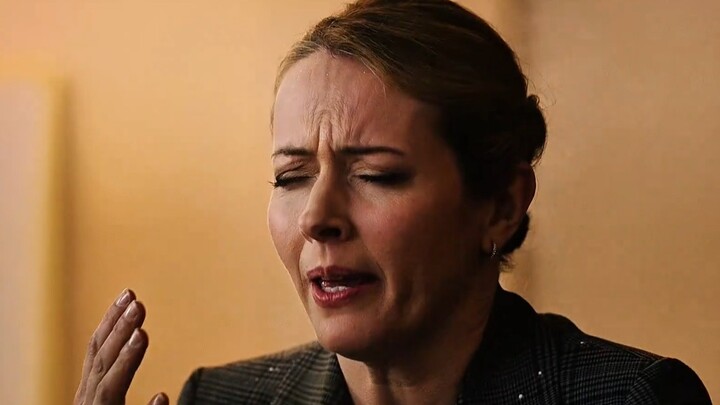 A woman got a faceful of mysterious powder sprayed at her by a greeting card?