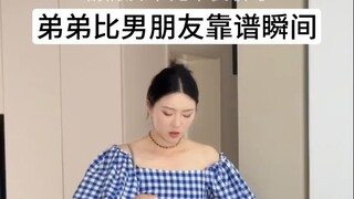 弟弟才不觉得箱子重！