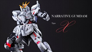 يروي فيلم "أجنحة المعجزة المسماة X" من إنتاج شركة MG عملية تحويل معدات "Phoenix" X إلى Gundam ومشهد 