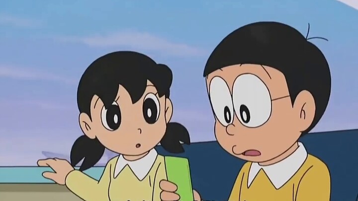 Doraemon: Fat Tiger wakes up to find a baby next to him, and has no choice but to take care of the b