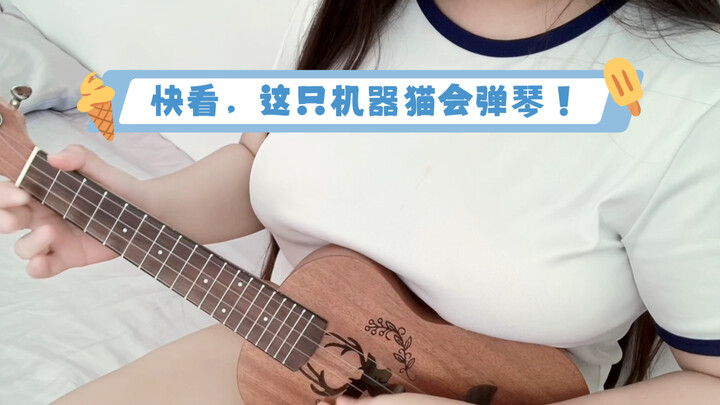 Mau kucing robot yang bisa main ukulele?