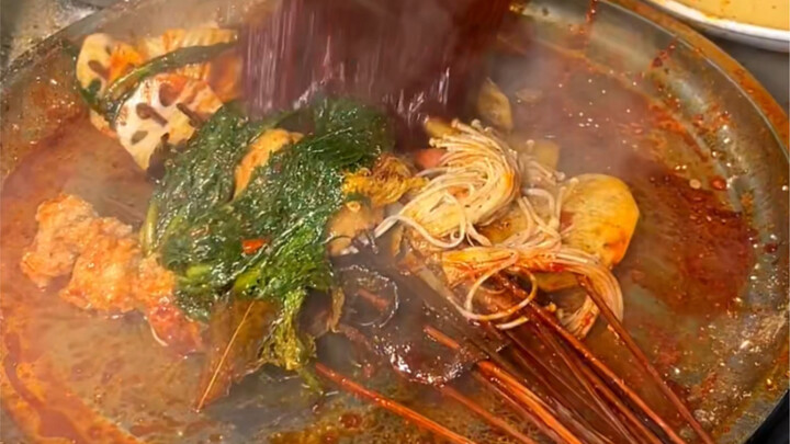 Gansu mala tang by the streets of Tianshui—loaded with chili, and the meatballs inside are seriously