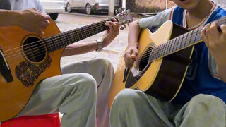 Amani dan putranya bernyanyi dan bermain gitar bersama