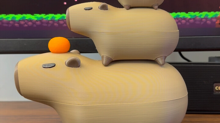 The capybara matryoshka is so hilarious, and its little orange buddies are just perfect as decor! #T