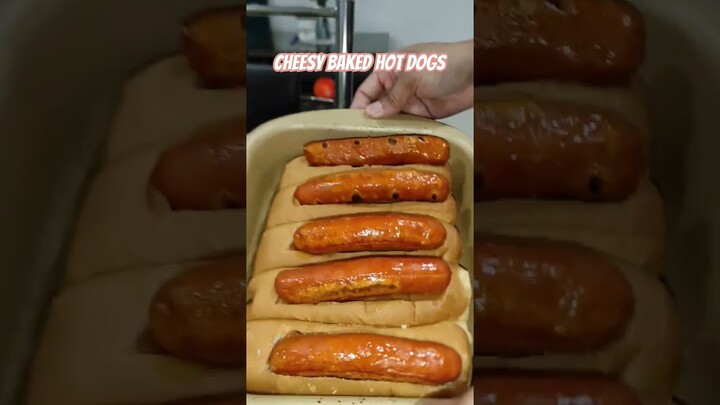 Cheesy baked hot dogs #fy #cooking #food#foodie #foodlover #fypage #hotdogs #cheesyhotdogs #fypviral