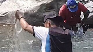 cast netting in Nepal | himalayan trout with handmade cast net |