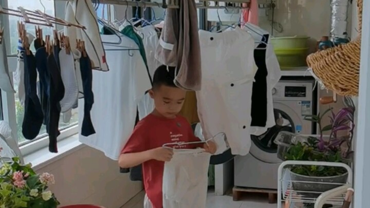 Future daughter-in-law—she’s already been perfectly trained to hang clothes! If the hanger’s too big