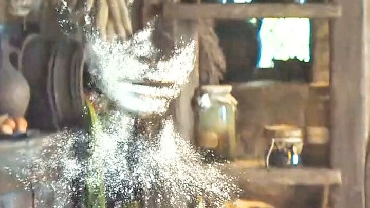 The Invisible Man overturns the flour on the table to write out a distress signal; swept away by a c