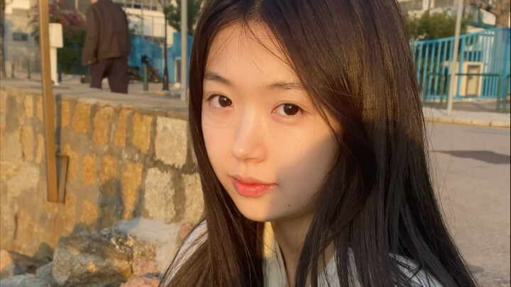 Singing "Good" at the beach without makeup