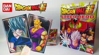 Abriendo 2do paqueton de album DRAGON BALL SUPER SUPERHERO Bandai