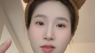 Whose wife is she?