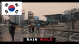 Walk in the rain, near Seoul Station - South Korea