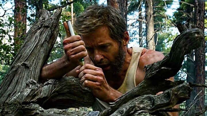 [Wolverine] Weeps at the crooked cross in front of the grave