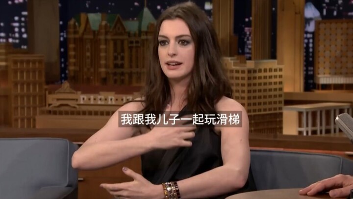 Anne Hathaway and her son don’t seem to be playing on the slide, haha.
