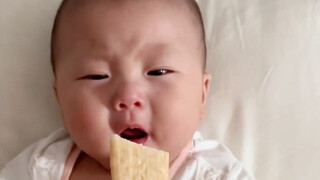 When you have a baby who loves to eat, just hand her a piece of millet cake when she cries!