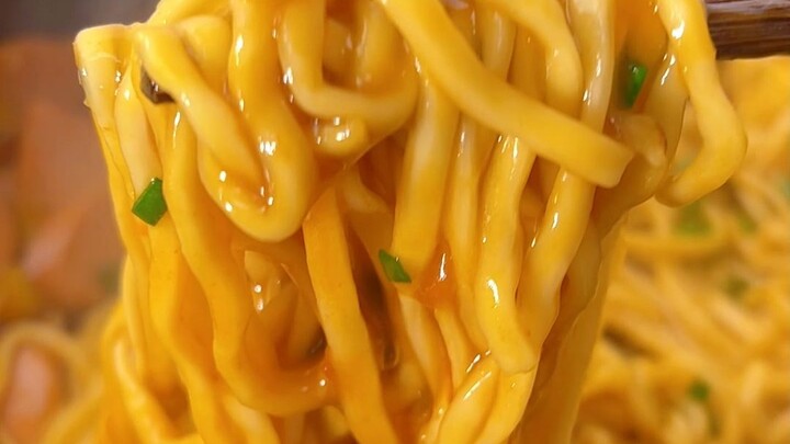 Serve this tomato and poached egg braised noodle dish, and I dare you not to fall in love with it!