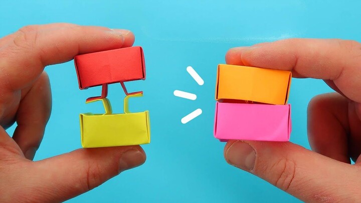 Gluing these two origami toys together is so much fun!
