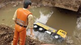 Toy trucks cover the bridge, and waterside engineering vehicles are more fun