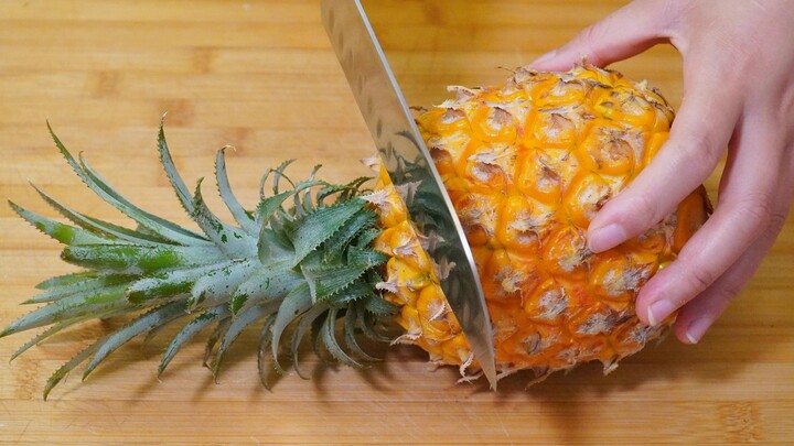 It turns out cutting a pineapple is so easy—no need to scoop out the eyes or peel it, quick and effo