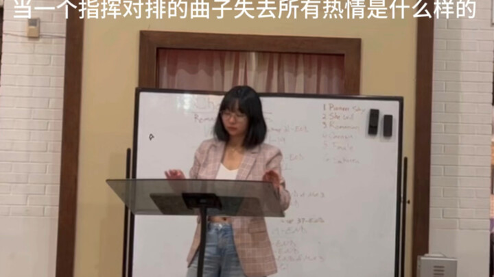 When a conductor loses all passion for the piece her band is playing (a playful take)