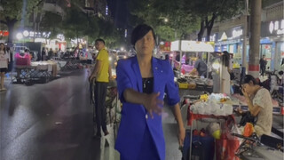 Blue chicken appears at night market