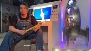 صندوق كمبيوتر على شكل صاروخ ذاتي الاشتعال والتشغيل