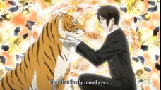 Sebastian petting the tiger :D