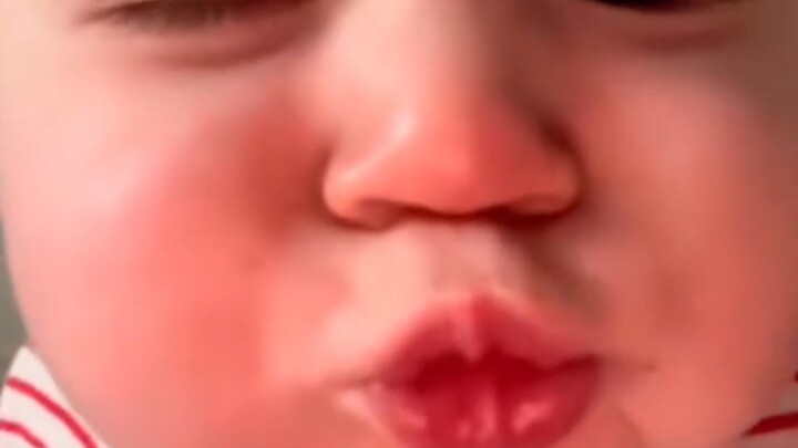 Cute kids are waving hello to you through the screen—so adorable!