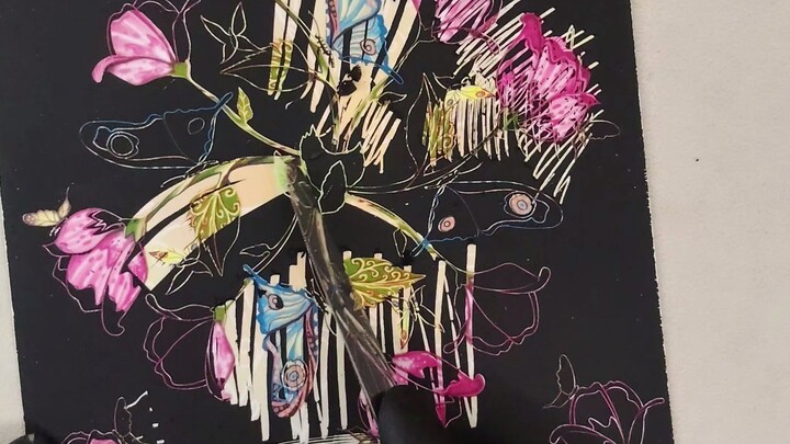 I'm carving a mandala with a fork and knife; I'm providing the link to the YouTube video.