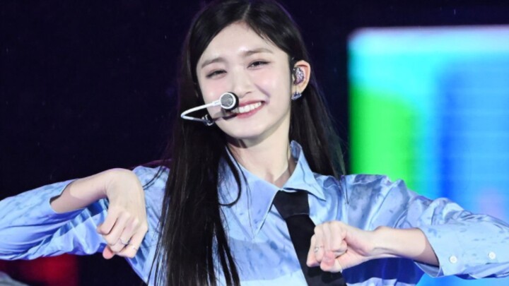 "Smiling the whole time in the heavy rain, she glanced at her scraped knee and immediately resumed h