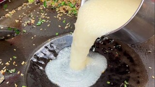 الأخت الكبرى في قوييانغ تبيع أرز غاو لو، بعشرة يوانات للوعاء، مع 7 أنواع من الخضروات و3 أنواع من الف