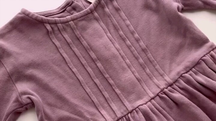 The little girl said her clothes must be embroidered.