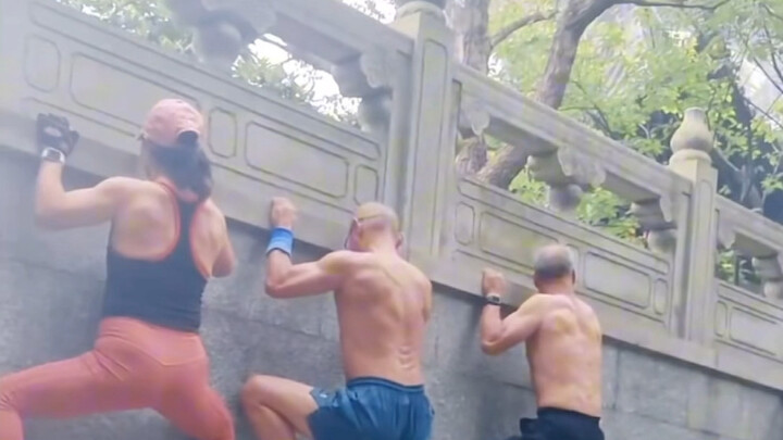 Elderly men and women engage in intense morning workouts—truly impressive strength!
