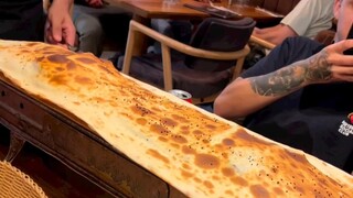 Cut the top of the dough and you'll find a hole inside.