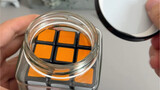 Tahukah Anda cara mengeluarkan Kubus Rubik dari botol?
