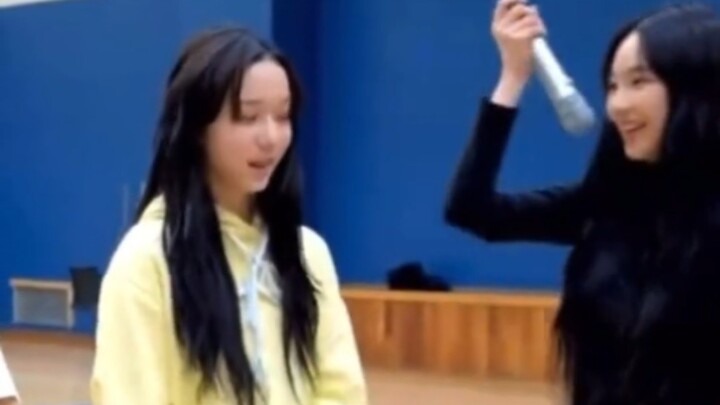 Sister Liu and Xiao Dong show off their cool moves; Xiao Juan does a "reverse mic" gesture with my b