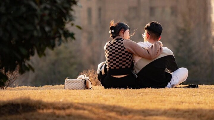 On an ordinary afternoon, a gentle breeze caressed their faces; he gazed lazily into the distance wh