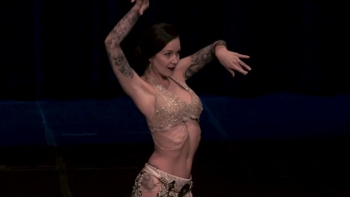 Intoxicating fusion belly dance! Sara Lynn is dynamic and graceful, soft and boneless, like a python