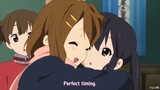 Every time Yui cuddles Azusa's cheeks ( K-ON!! )