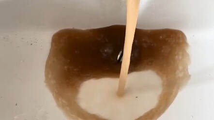 The faucet is spouting coffee